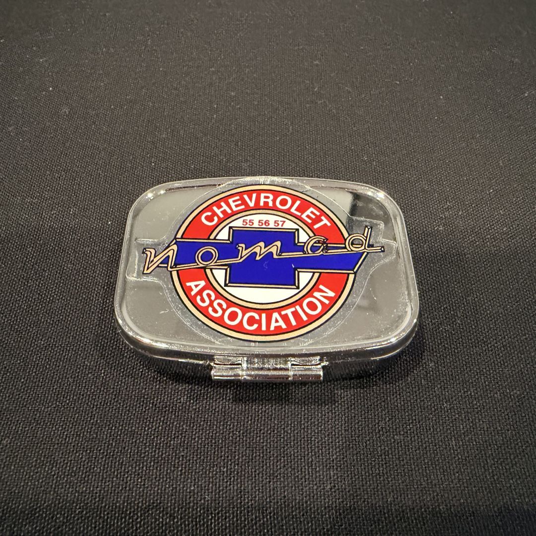 Pill box with Chevrolet Nomad Association Logo